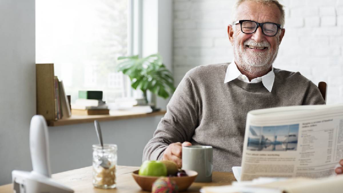 Old Man Reading Paper