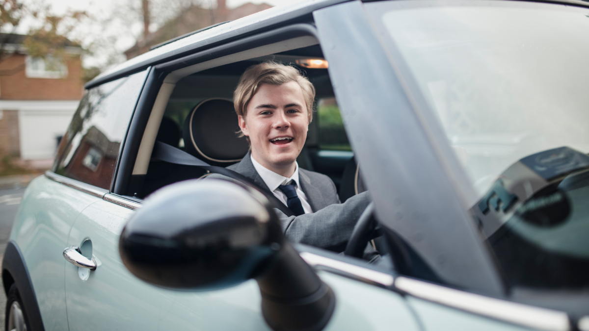 Business man driving car